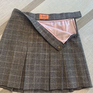 Juicy Couture wool plaid pleated skirt with pink lining. 17” long. Worn twice.